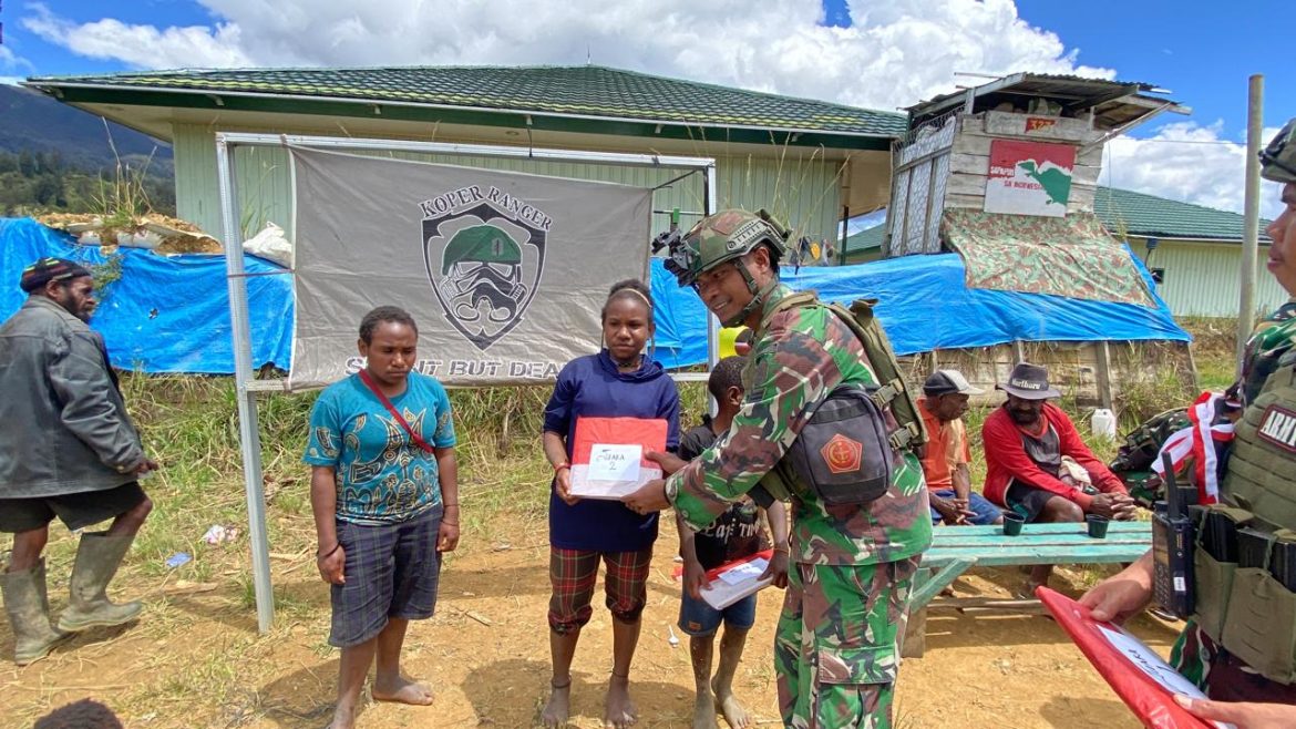 Semarakkan HUT RI Ke-79, Ksatria Yonif 323 Buaya Putih Gelar Lomba dan Makan Bersama