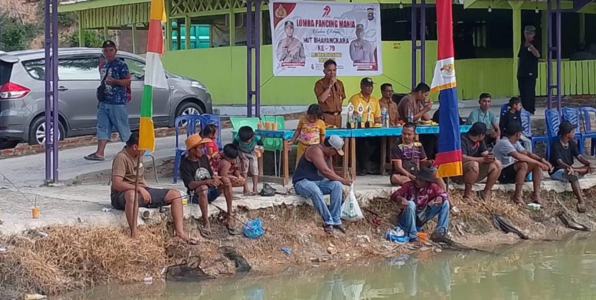 Polsek Kerinci Kanan Meriahkan HUT Bhayangkara ke-79 dengan Lomba Mancing Mania