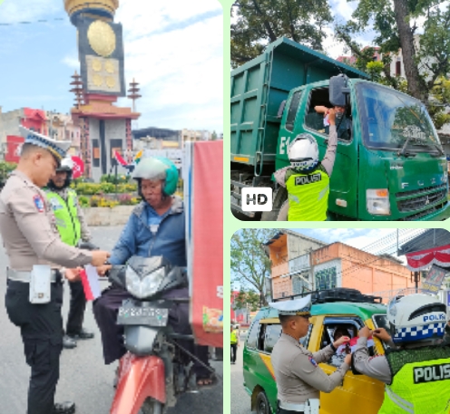 Sambut Hari Kemerdekaan, Satlantas Polres Langkat Bagikan Benderaerah Putih Kepada Pengguna Jalan.