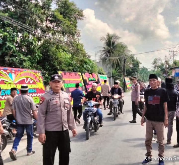 Kapolsek Secanggang Bersama Camat, Unsur Muspika, dan Kepala Desa/Lurah Melayat ke Rumah Duka Kepala Desa Suka Mulia.