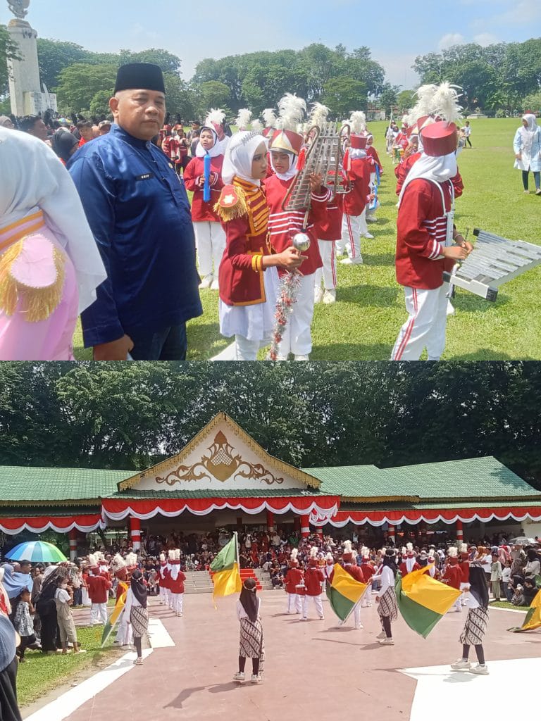 Semarak HUT RI, Siswa SDN 050711 Pasar Gunung Tampil Memukau dalam Festival Drumband di Alun-Alun Langkat.