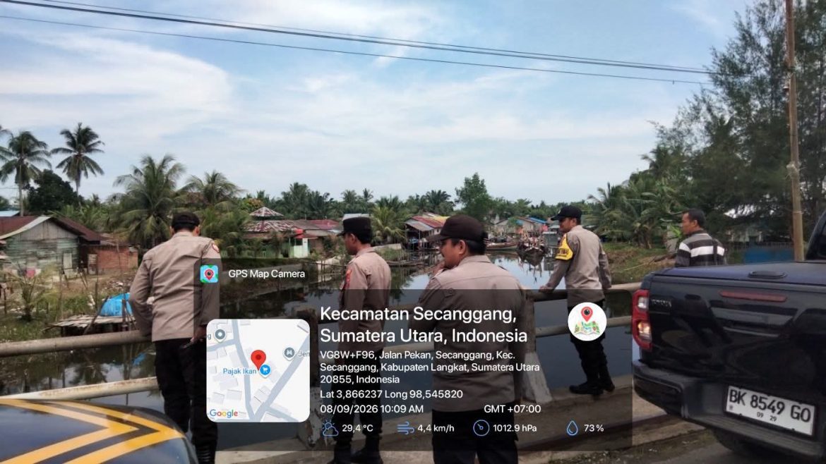 Polsek Secanggang Laksanakan Patroli Pemantauan Ketinggian Air Sungai Secanggang.