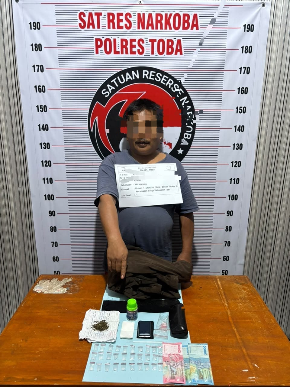 Pengedar Narkoba Ancam Polisi dengan Cangkul di Rumahnya di Balige, Sempat Terjadi Pergumulan